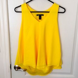 Bright yellow Kenneth Cole sleeveless blouse